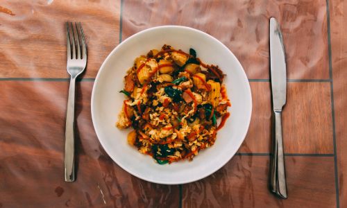 plate of stir fried vegetables and rice