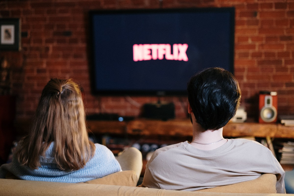 couple watching netflix.jpg Couple watching Netflix on their TV