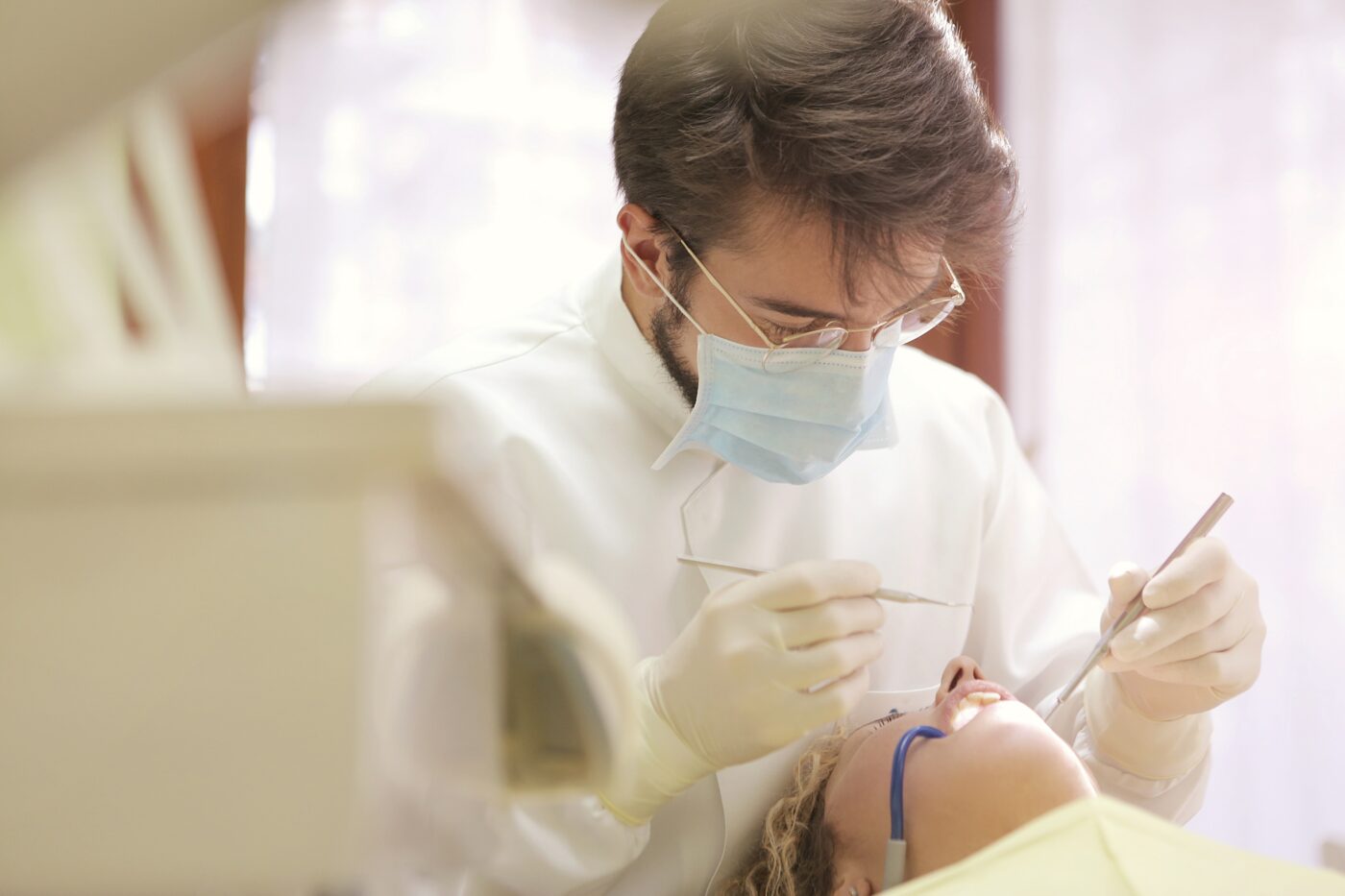 do students get free dental care - dentist with patient