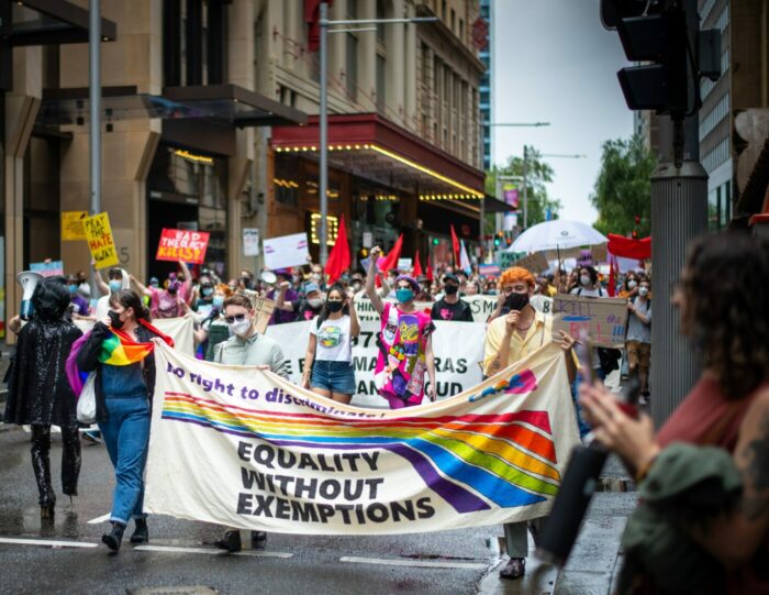 Pride month parade protests in street