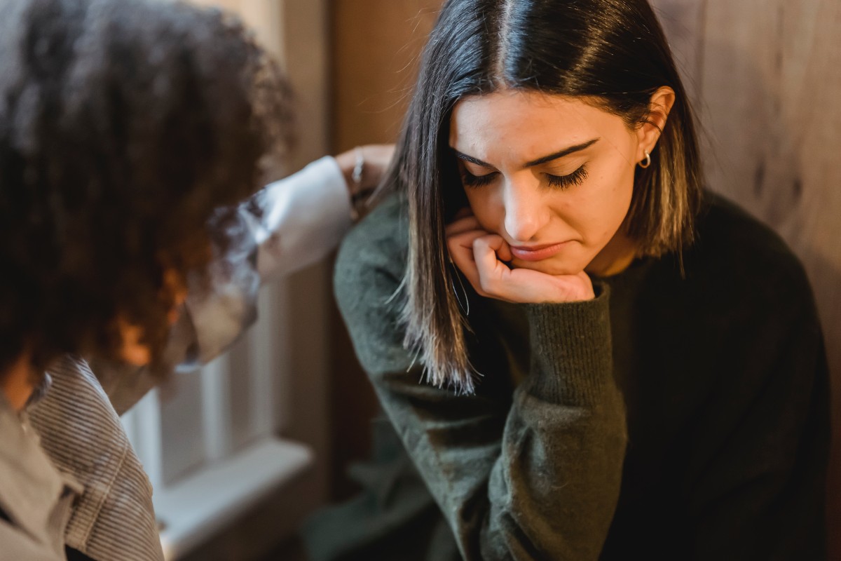girl consoling another girl