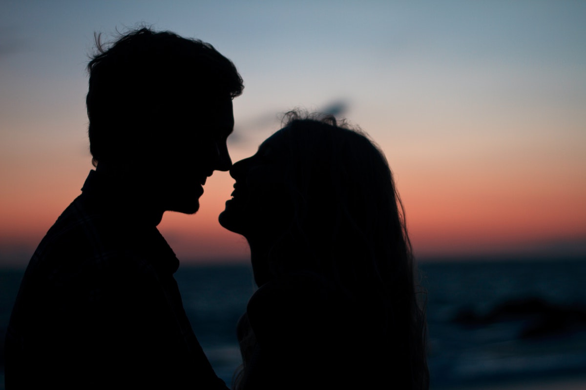silhouette of couple in sunset