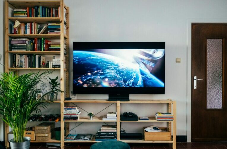 Image of a tv playing a movie in a student house