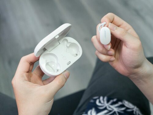 White Bose QuietComfort earbuds